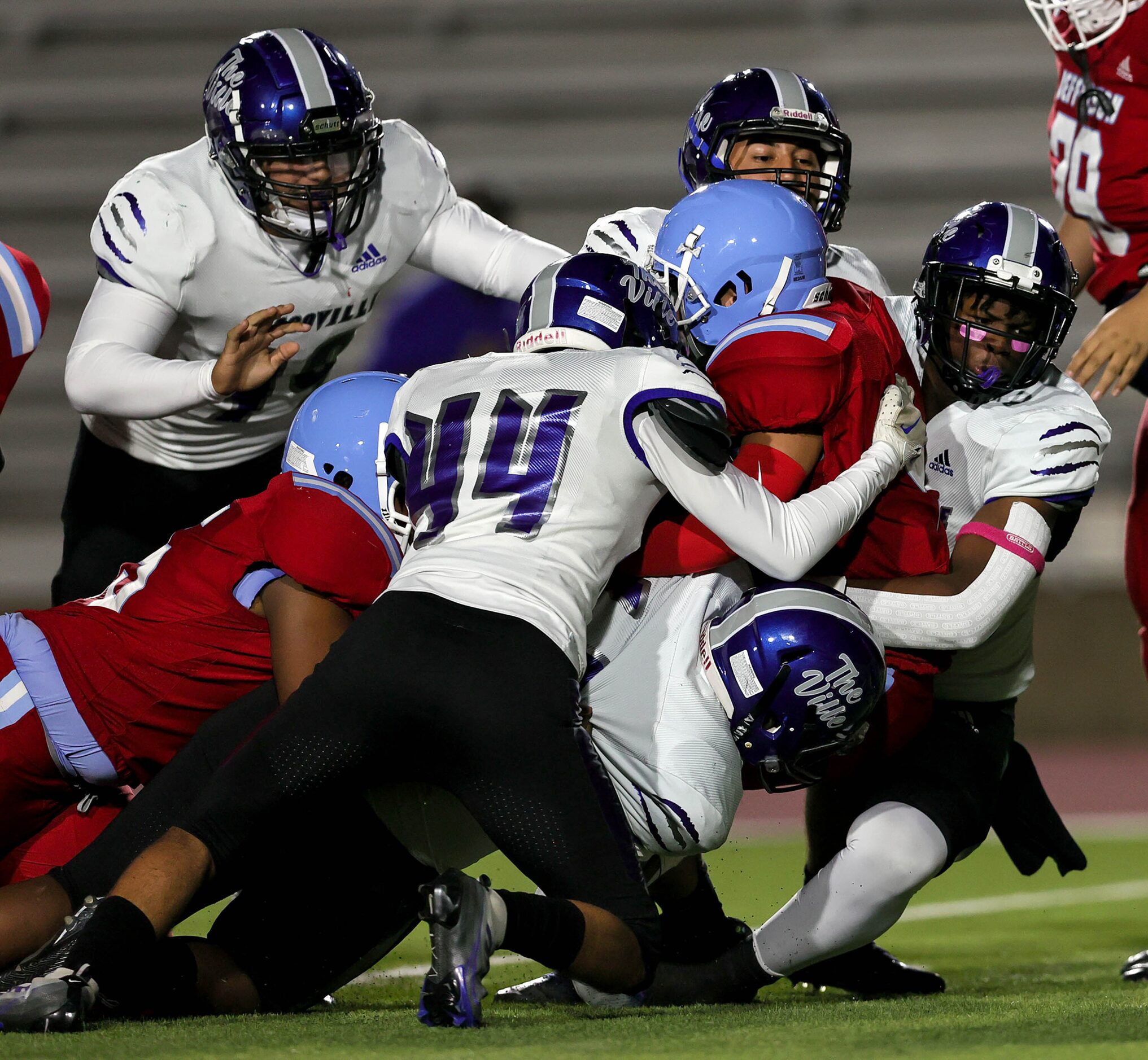 The Seagoville defense stuffs Thomas Jefferson running back Jovani Soberanes during the...