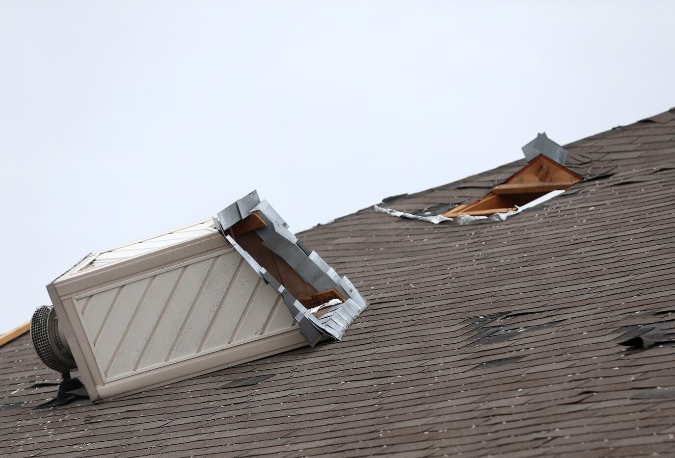 A tornado-damaged home in the 1500 block of Allen Drive in a Mesquite neighborhood on...