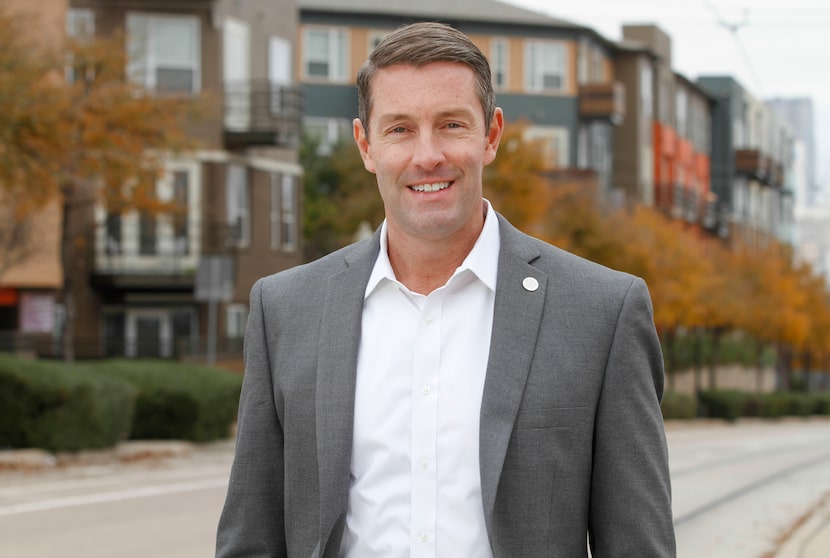 Dallas City Council member Chad West, standing on Zang Boulevard in the Oak Cliff...