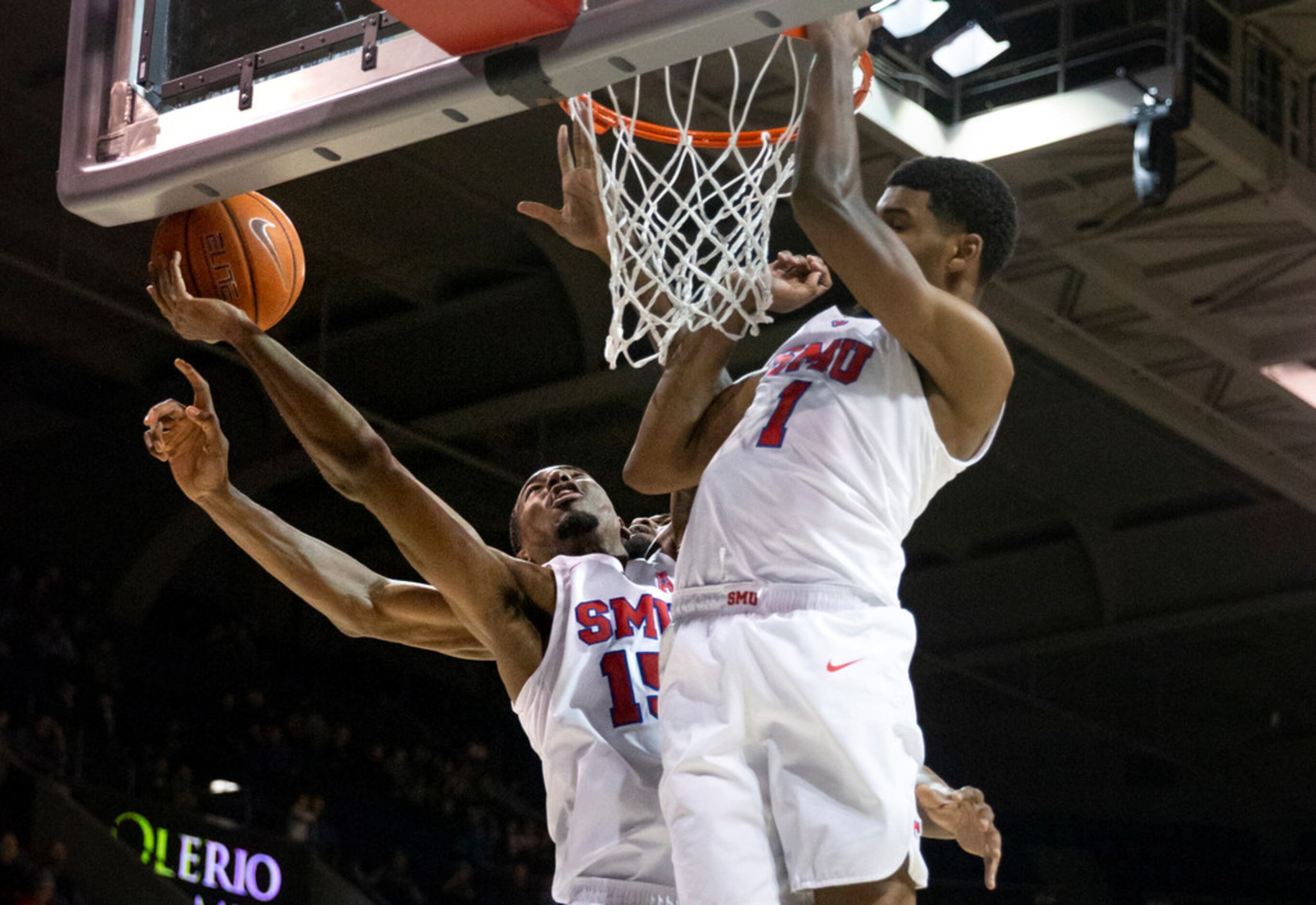 Southern Methodist Mustangs forward Isiaha Mike (15) struggles and fails to control the ball...