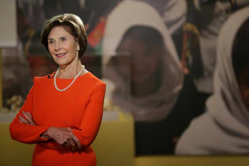 Former First Lady Laura Bush gives The Dallas Morning News a tour of the new exhibit titled...