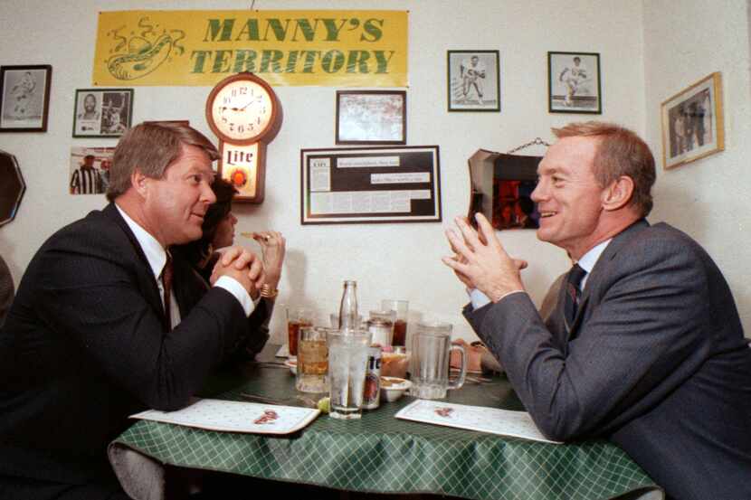 Jerry Jones sits with then University of Miami coach Jimmy Johnson at a Dallas restaurant....