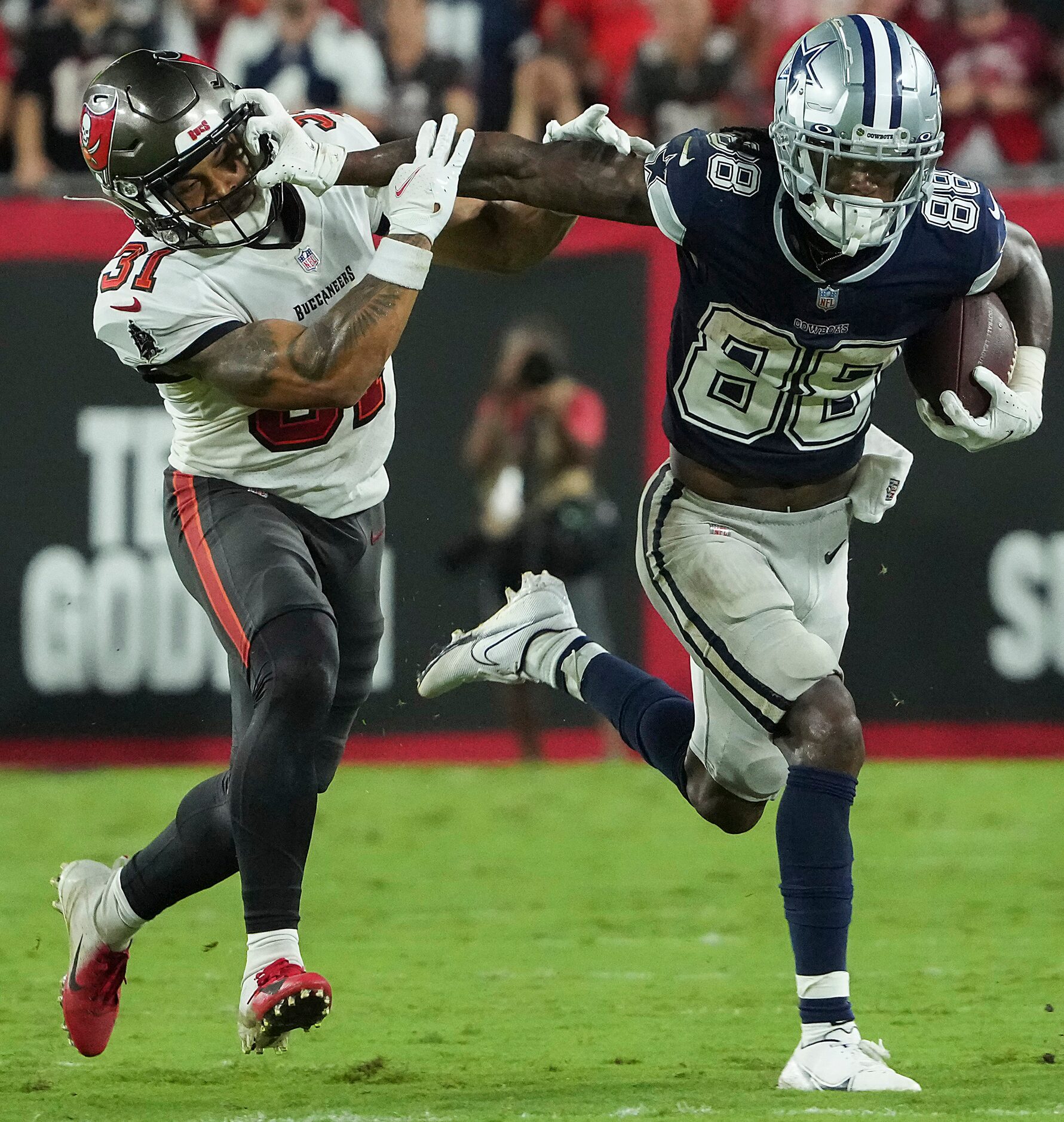 Dallas Cowboys wide receiver CeeDee Lamb (88) pushes past Tampa Bay Buccaneers safety...