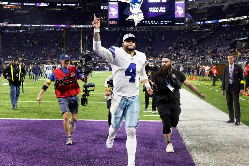 Dallas Cowboys quarterback Dak Prescott (4) celebrates the teams big win over the Minnesota...
