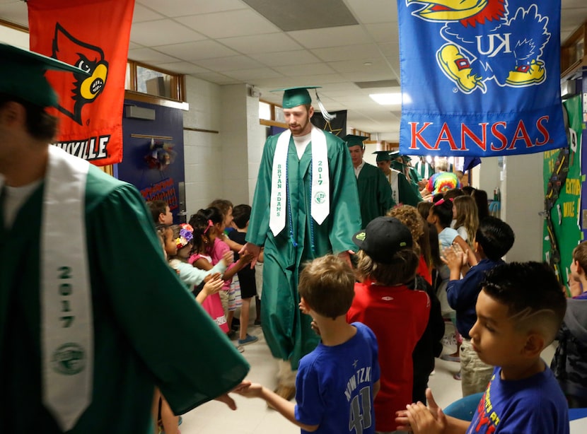 Bryan Adams High School senior Kirby Lohrengel and classmates walked through the halls of...