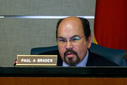 Board member Paul Braden gives remarks during a Texas Department of Housing and Community...