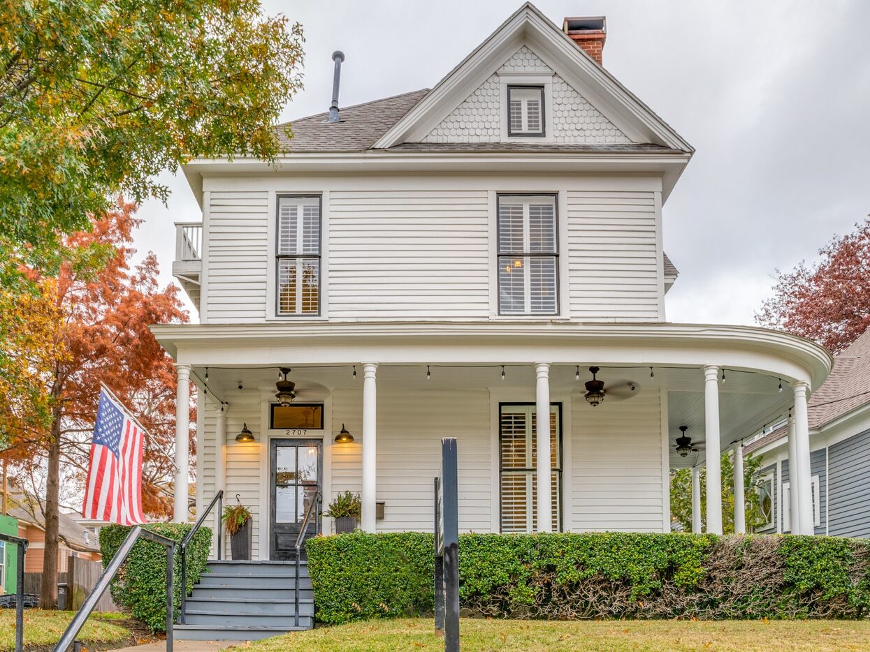 Exterior of a Victorian home with a picturesque wraparound porch.