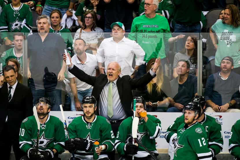 Dallas Stars head coach Lindy Ruff reacts after center Radek Faksa was called for cross...