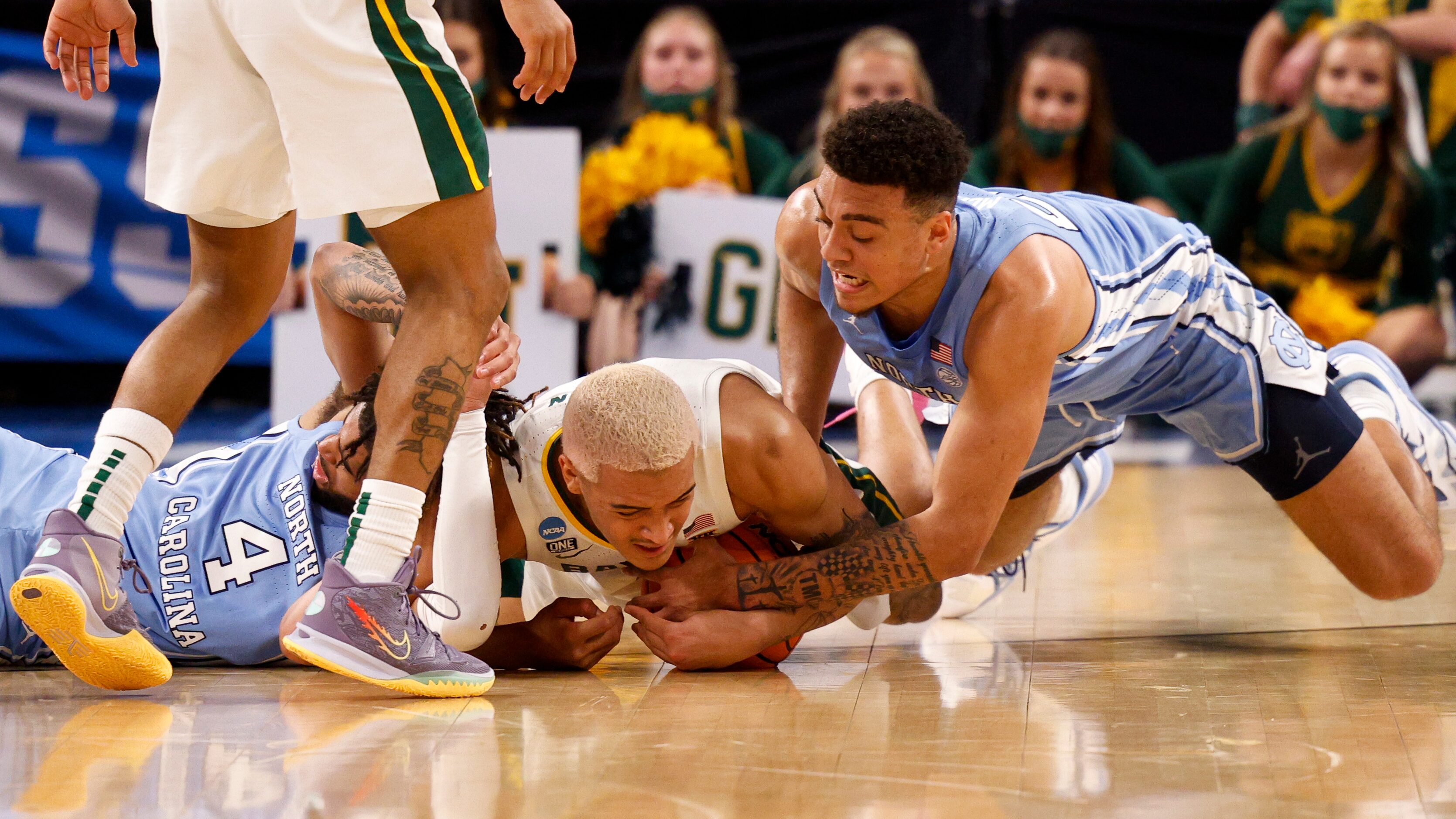 North Carolina Tar Heels guard R.J. Davis (4), Baylor Bears forward Jeremy Sochan (1) and...