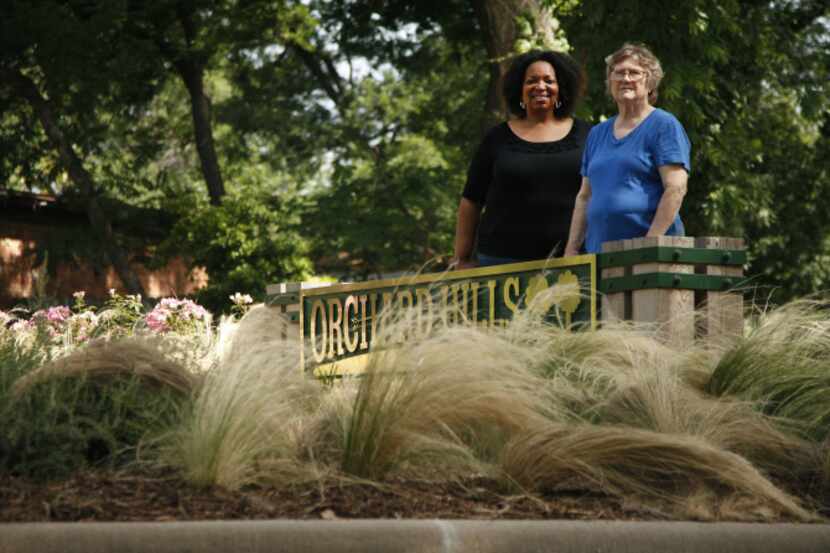 Garland Neighborhood Vitality Manager Felisa Conner (left) and Orchard Hills volunteer Betty...