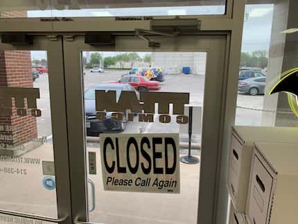 The doors of Titan Comics at Forest Lane and Webb Chapel Road as the store prepared to close...
