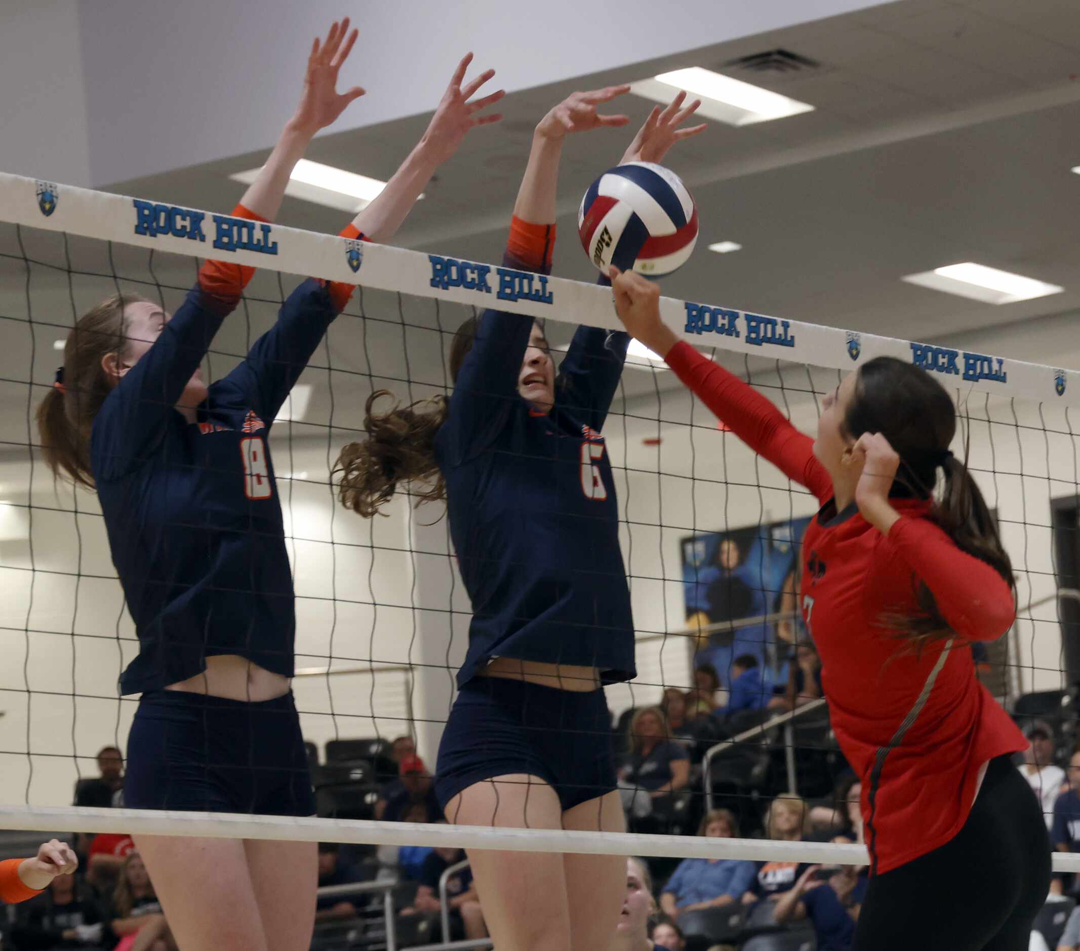 Frisco Liberty's MJ McCurdy (7), right, is unable to clear the ball past Frisco Lakeland's...