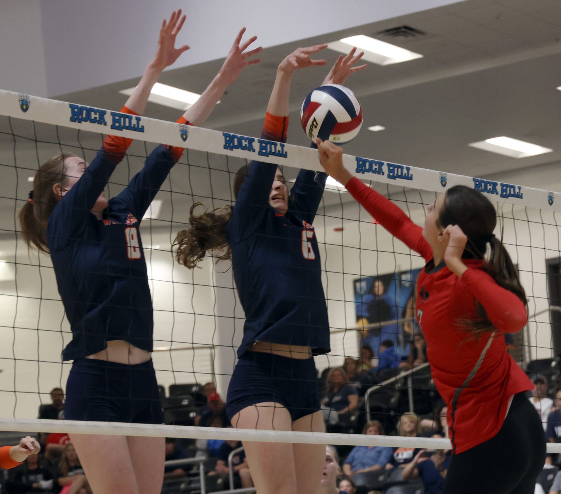 Frisco Liberty's MJ McCurdy (7), right, is unable to clear the ball past Frisco Lakeland's...