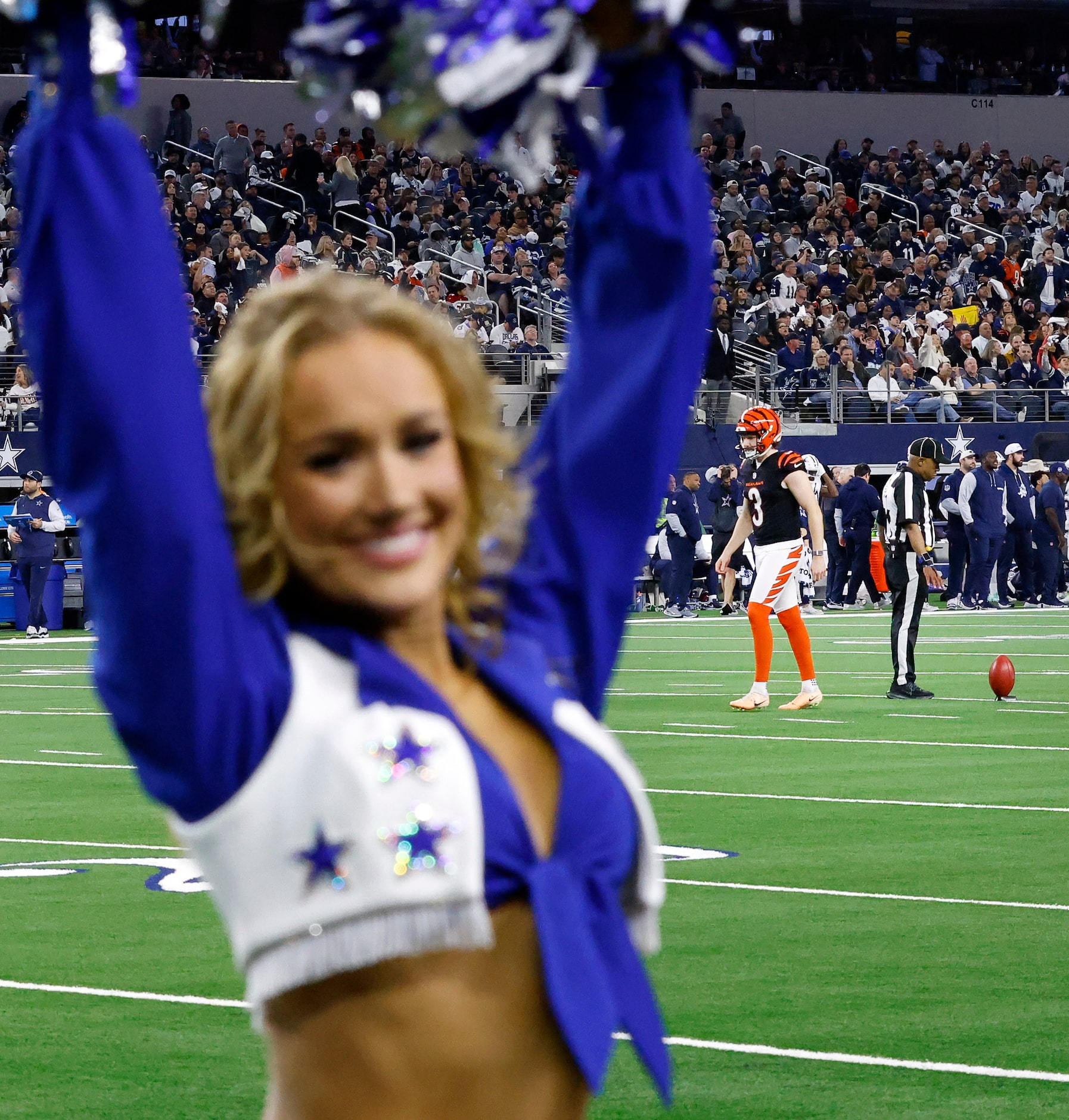 Dallas Cowboys Cheerleader Zoe Dale performs as her boyfriend and Cincinnati Bengals kicker...