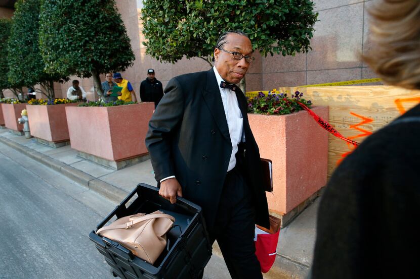 Dallas County Commissioner John Wiley Price arrives for the first day of his bribery trial...