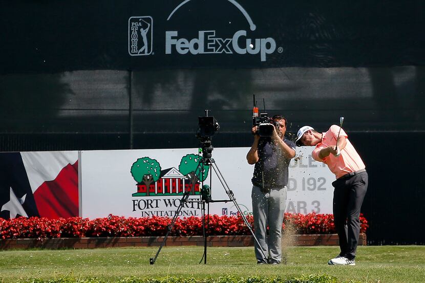 Justin Rose tees off on the 16th hole during the third round of Fort Worth Invitational at...