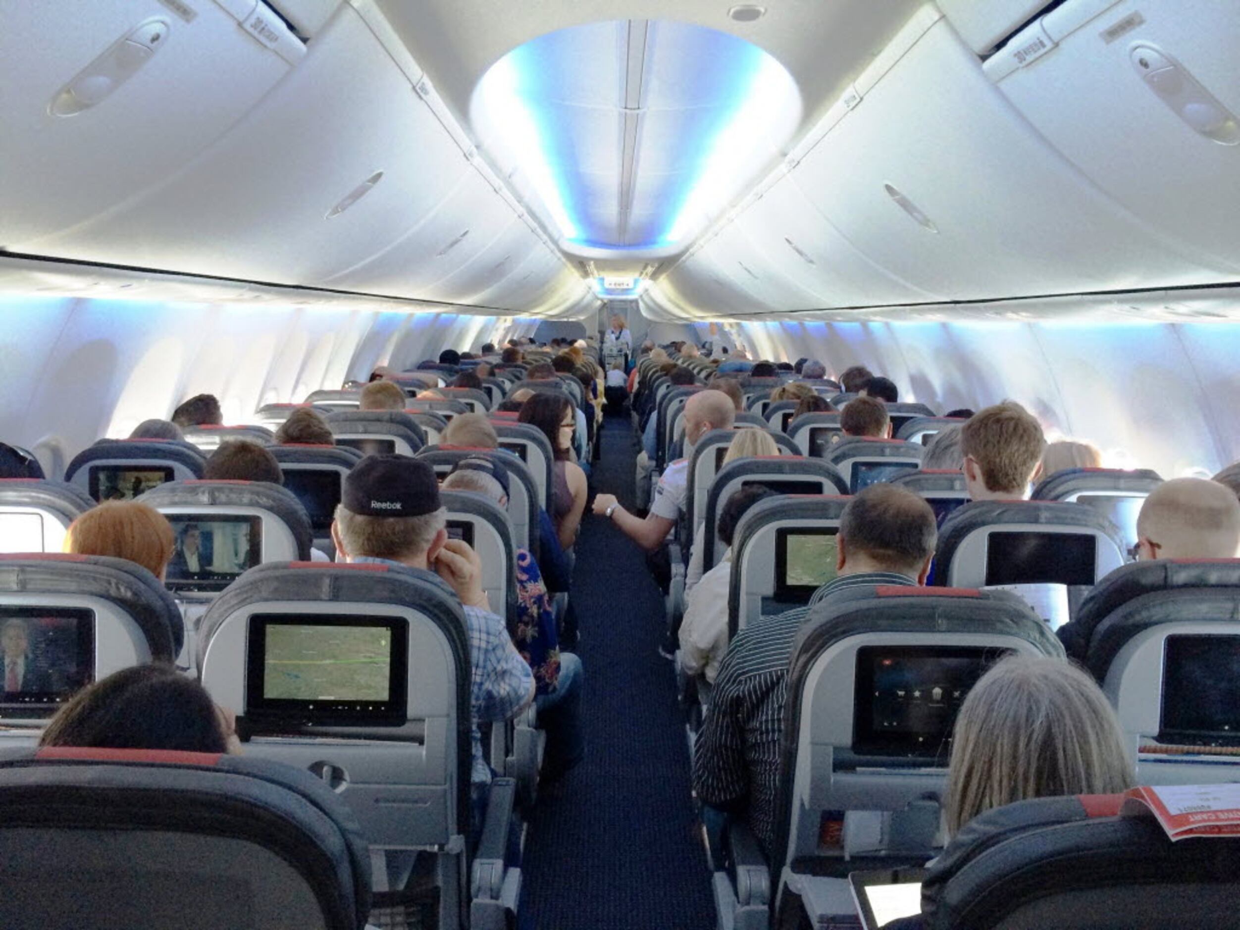 Premium Photo  A bottle of water for passenger on the aircraft