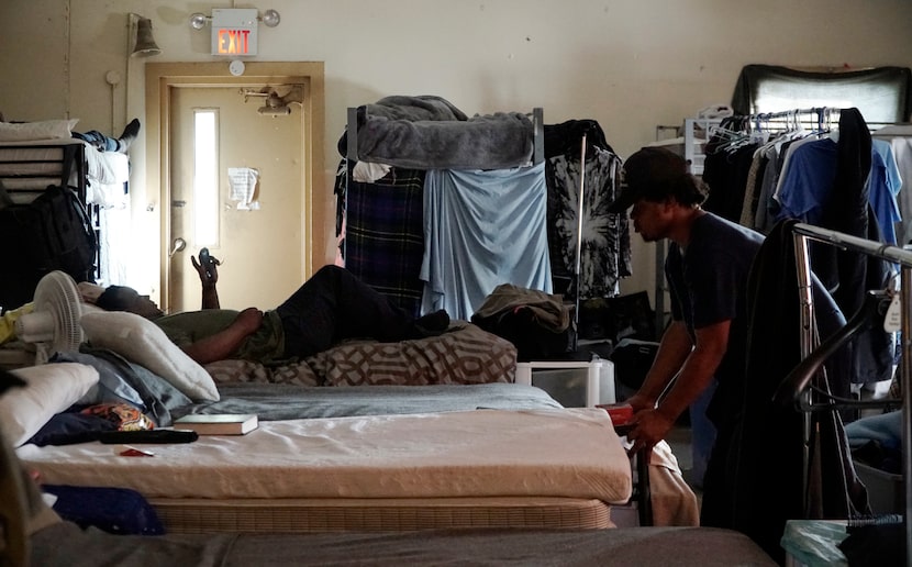 Men relax in their dorm at Soul’s Harbor in Dallas.