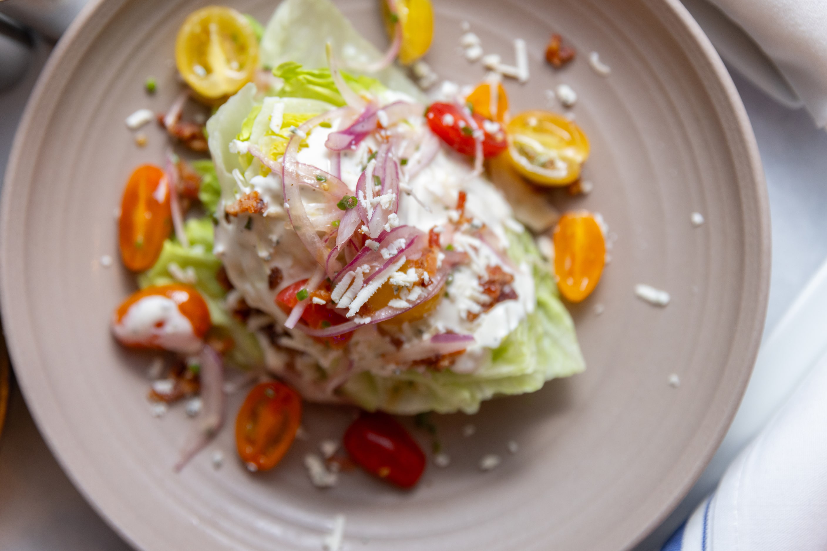 The classic wedge salad at Pesca in Dallas on Dec. 13, 2024. 