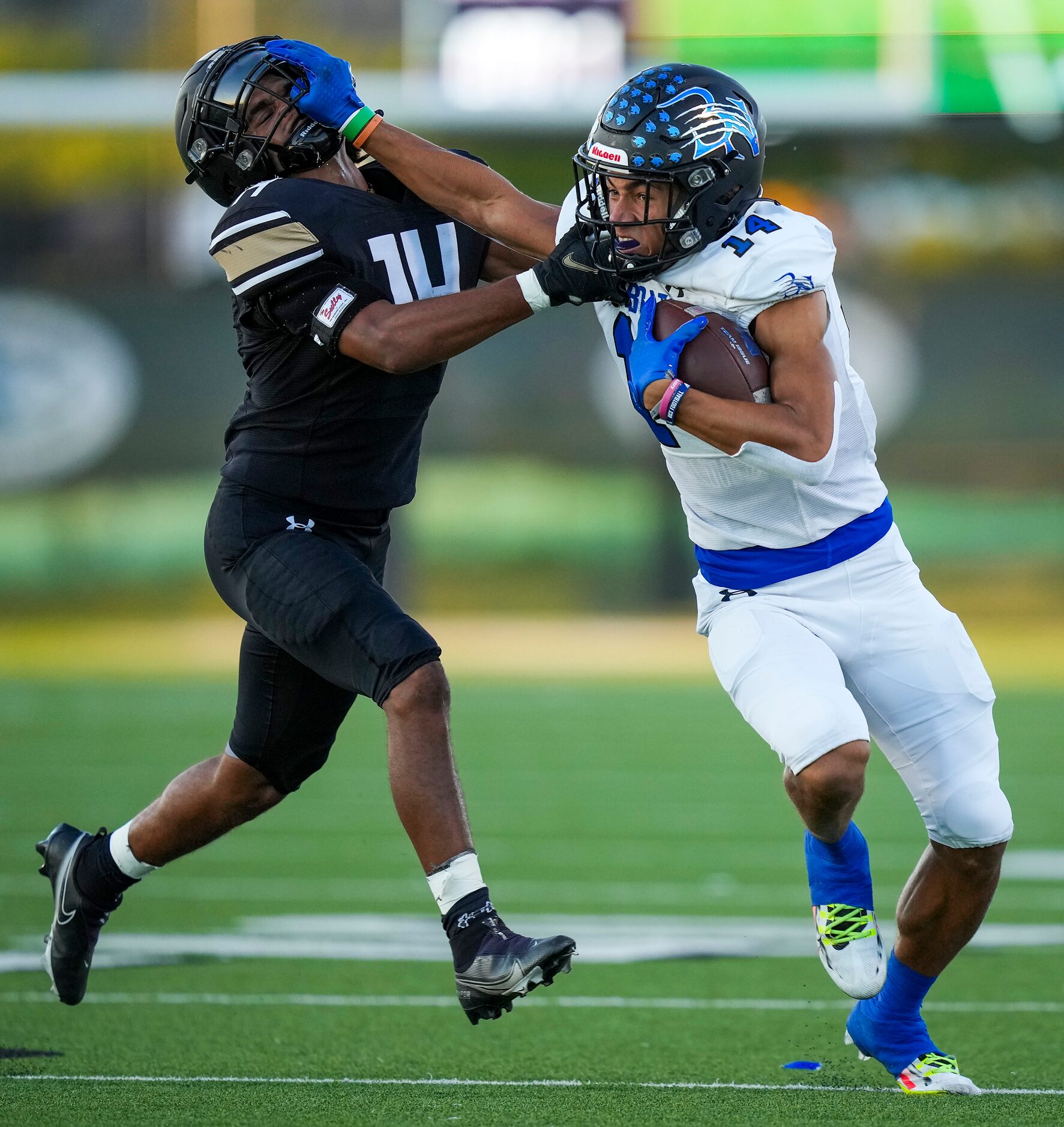 Trophy Club Byron Nelson wide receiver Landon Ransom-Goelz (14) pushes away from Keller...