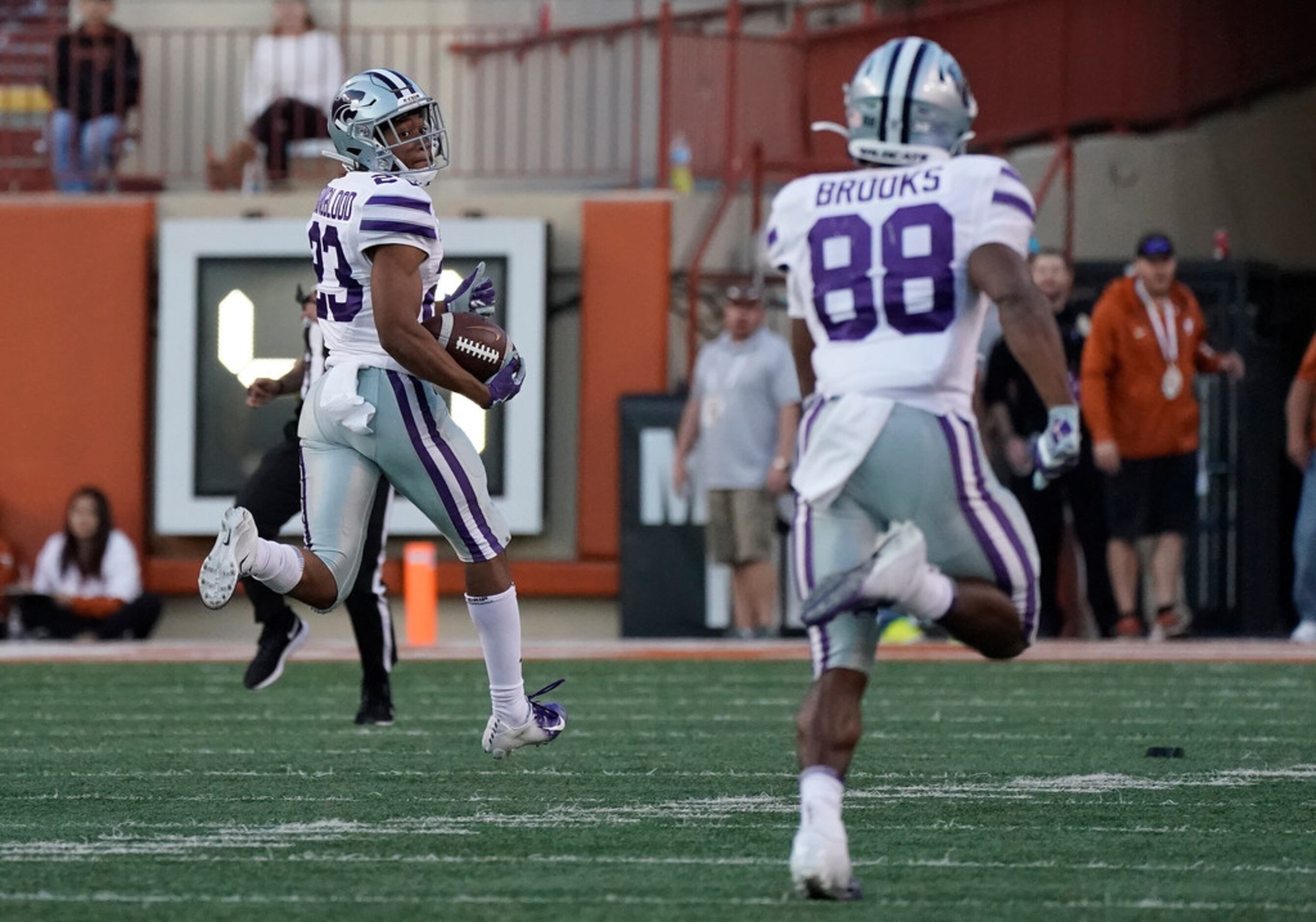 Kansas State's Joshua Youngblood (23) returns a kickoff for a touchdown against Texas during...