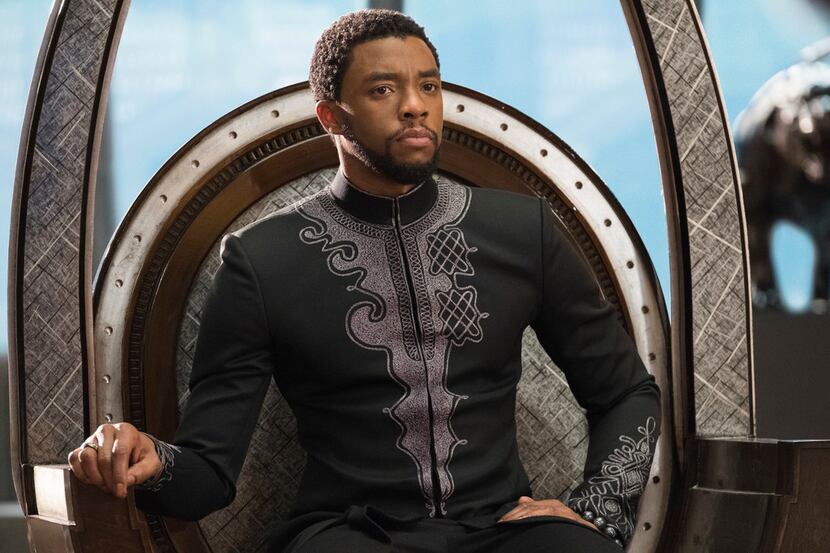 T'Challa (Chadwick Boseman) rakes in the dough, in the movie and at the box office as "Black...