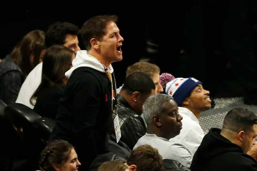 Dallas Mavericks owner Mark Cuban reacts during the second half of play in the NBA All-Star...