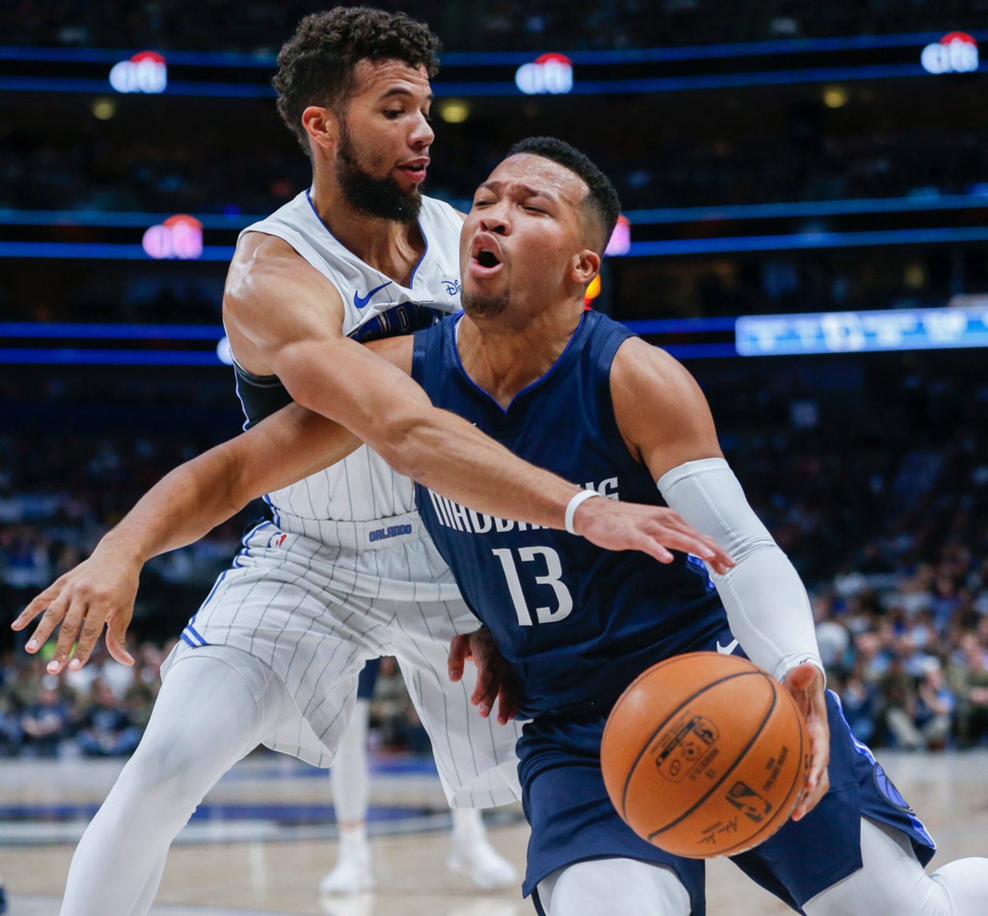 Dallas Mavericks guard Jalen Brunson (13) drives past Orlando Magic guard Michael...