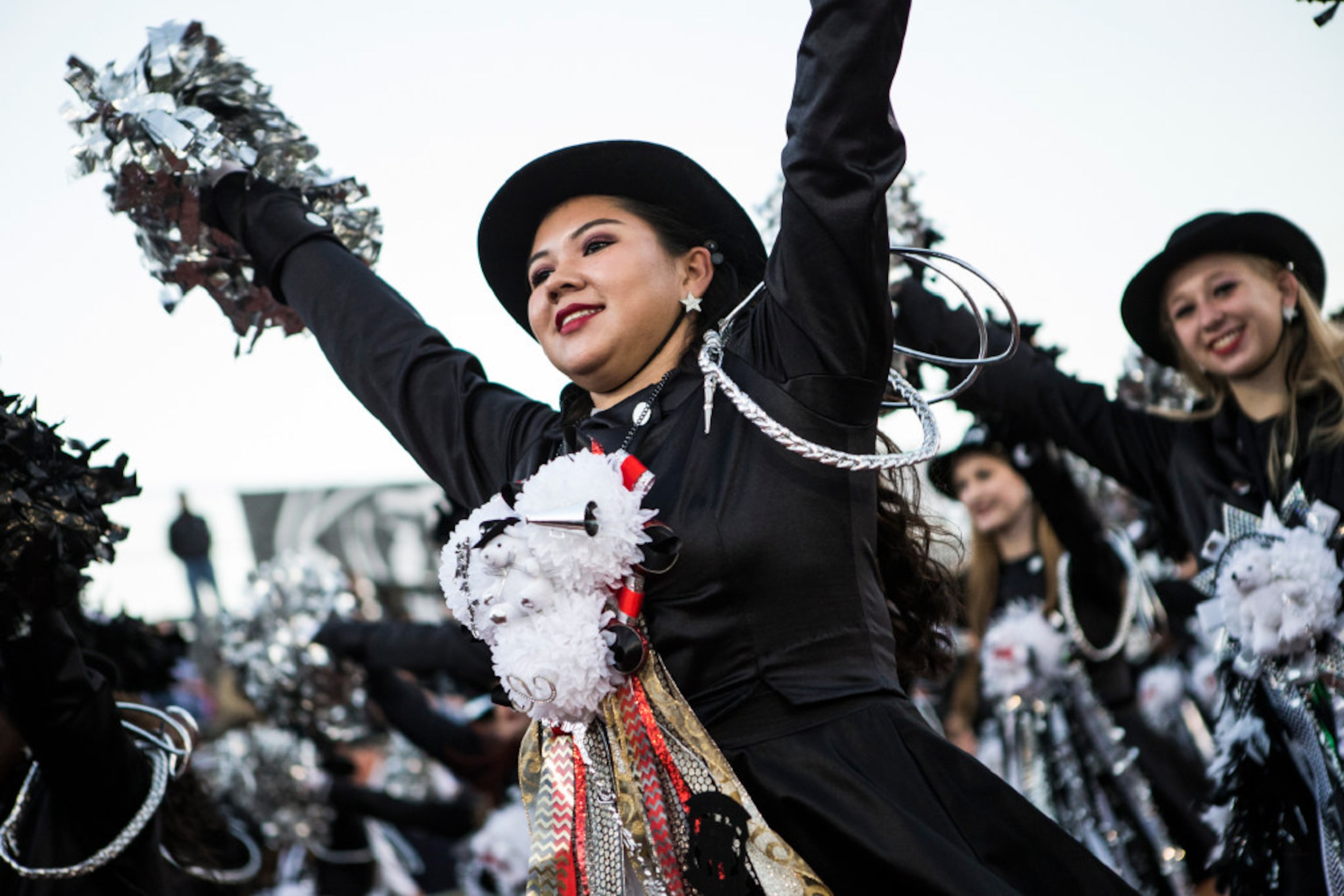 The Bishop Lynch dance team takes the field during Bishop Lynch's matchup against John Paul...