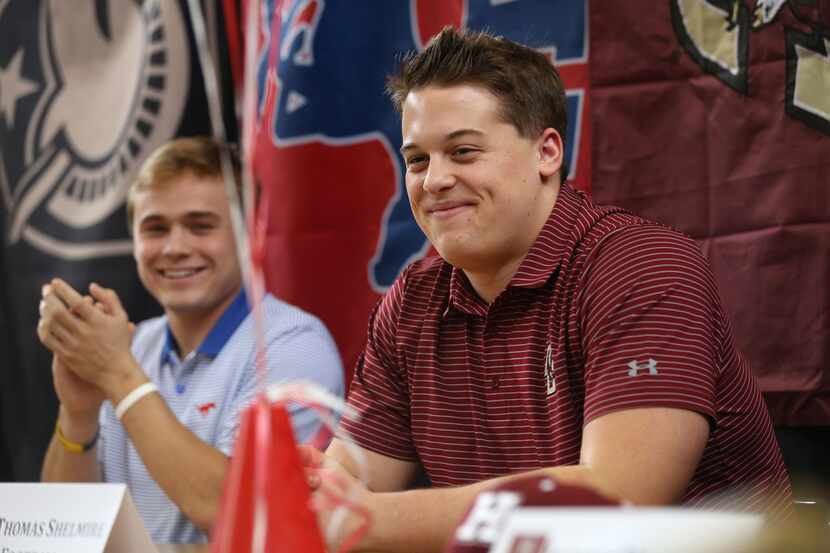 Thomas Shelmire, who is signing to play football at Boston College, reacts during Highland...