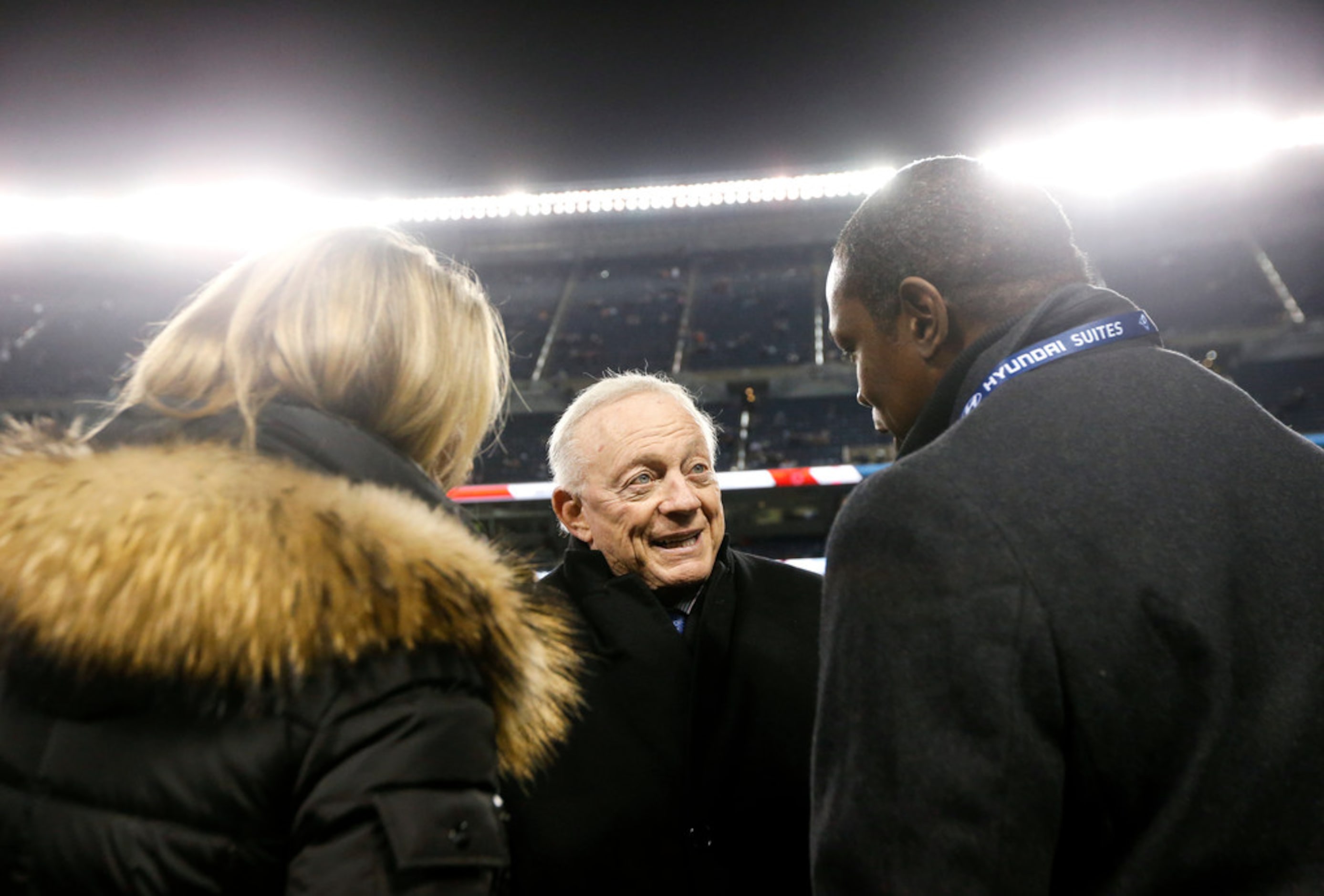 Dallas Cowboys owner Jerry Jones speaks with people on the sidelines prior to a NFL matchup...