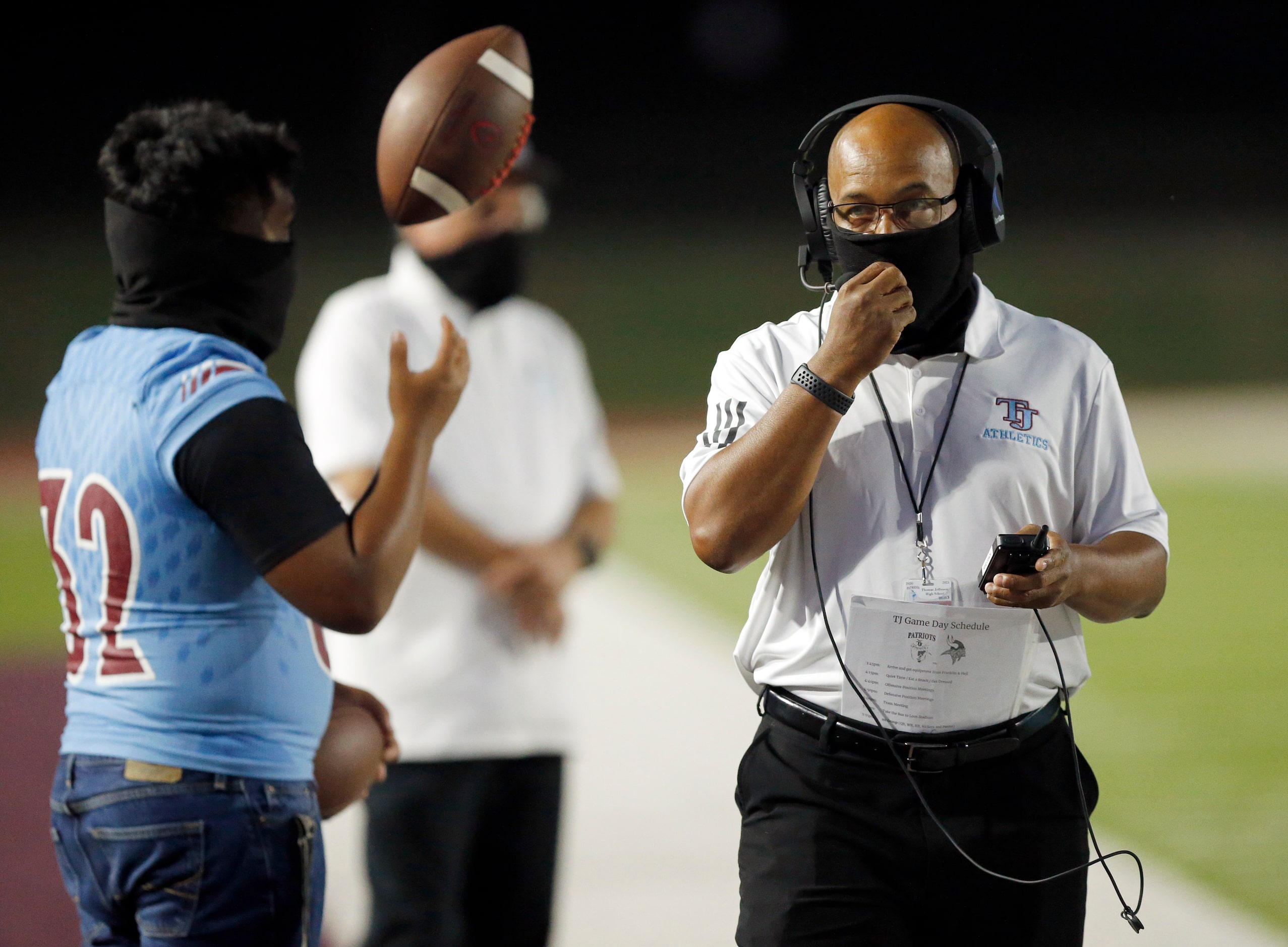 Thomas Jefferson head coach Kenny Jones paces the sideline as his team faces Pinkston at...