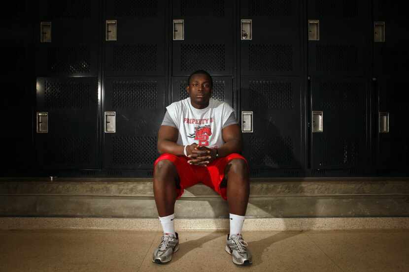 Photos of Rees Odhiambo, a senior defensive tackle for Mansfield Legacy High School, who...