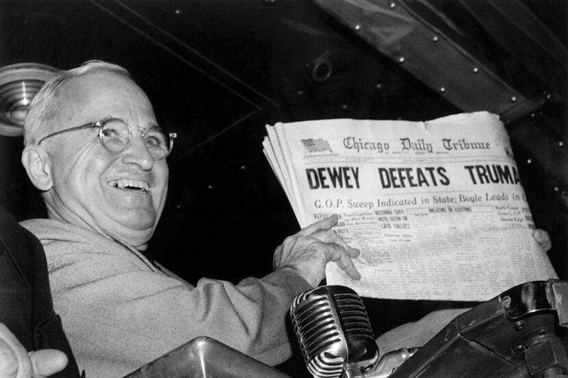FILE - In this Nov. 4, 1948 file photo, U.S. President Harry S. Truman holds up an Election...
