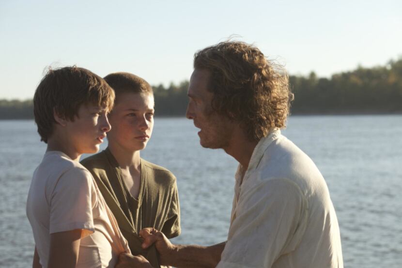 Matthew McConaughey, right, in a scene from Mud, which screened at the South by Southwest...