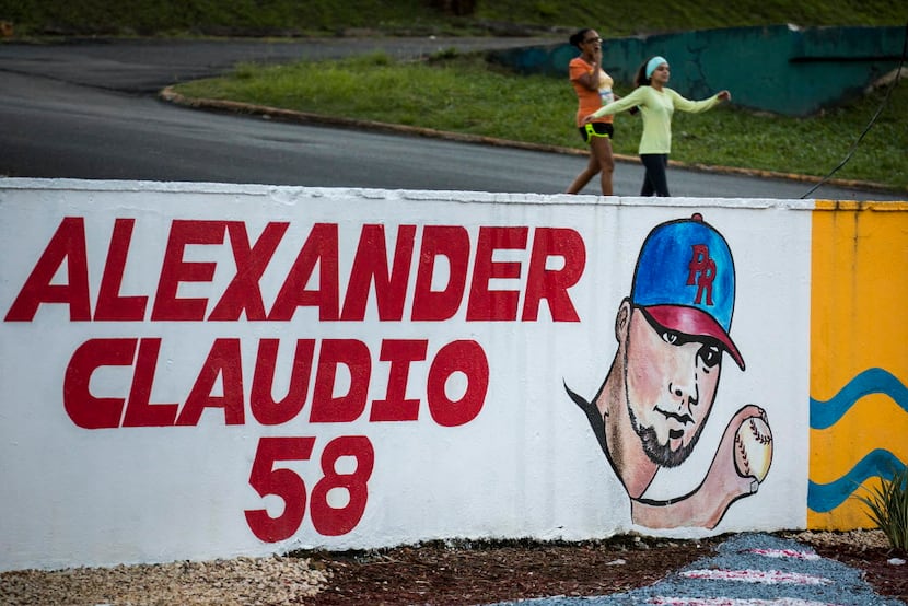 A mural honors Texas Rangers pitcher Alex Claudio in his hometown of Juncos, Puerto Rico.