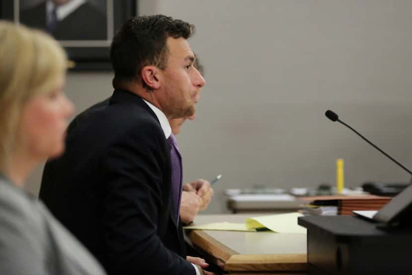 Former Texas A&M quarterback Johnny Manziel listens during a hearing with judge Roberto...