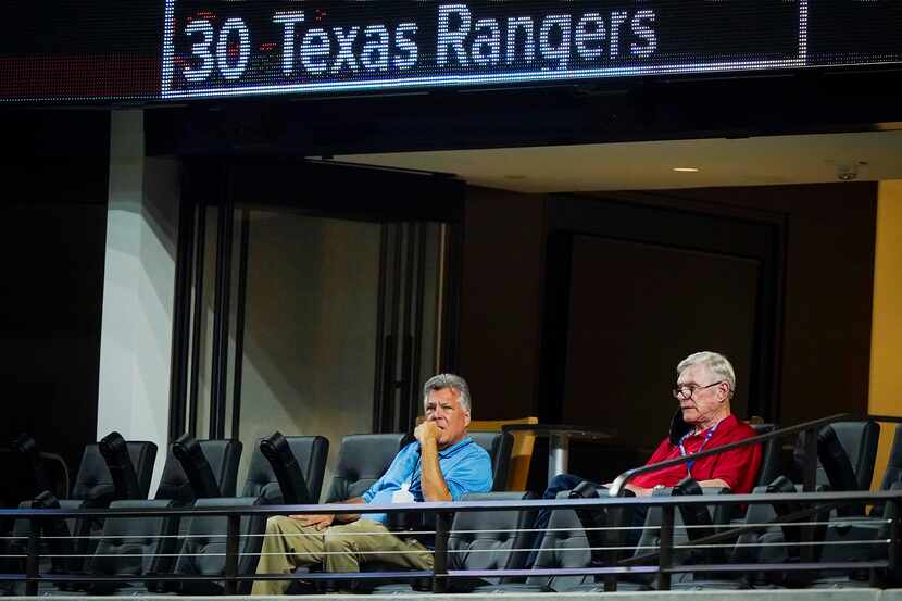 Texas Rangers co-chairman and managing partner Ray C. Davis (right) and chairman, ownership...