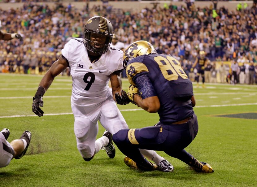 Notre Dame wide receiver Corey Robinson (88) makes a catch in front of Purdue defensive back...