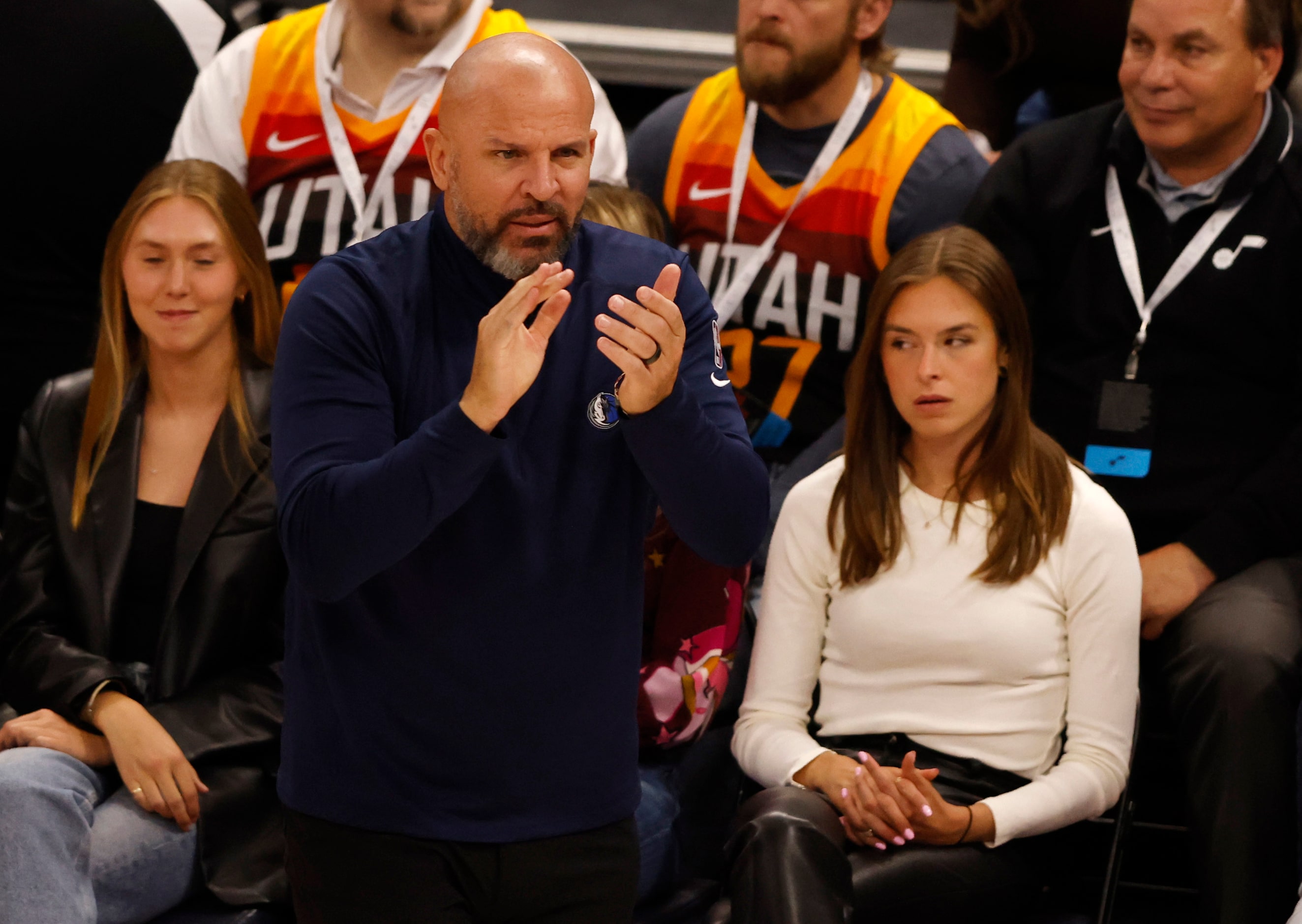 Dallas Mavericks head coach Jason Kidd claps for his team during the third quarter of game 6...