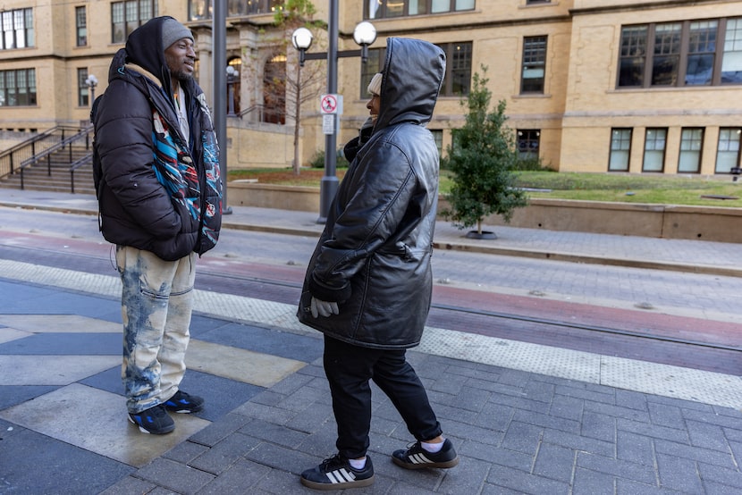 Shaniqua (left) and Henry Jones chat while waiting for the DART train on Jan. 7, 2024 in...