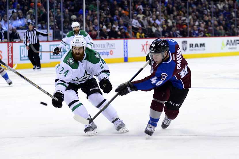 Feb 4, 2016; Denver, CO, USA; Colorado Avalanche left wing Alex Tanguay (40) attempts a shot...