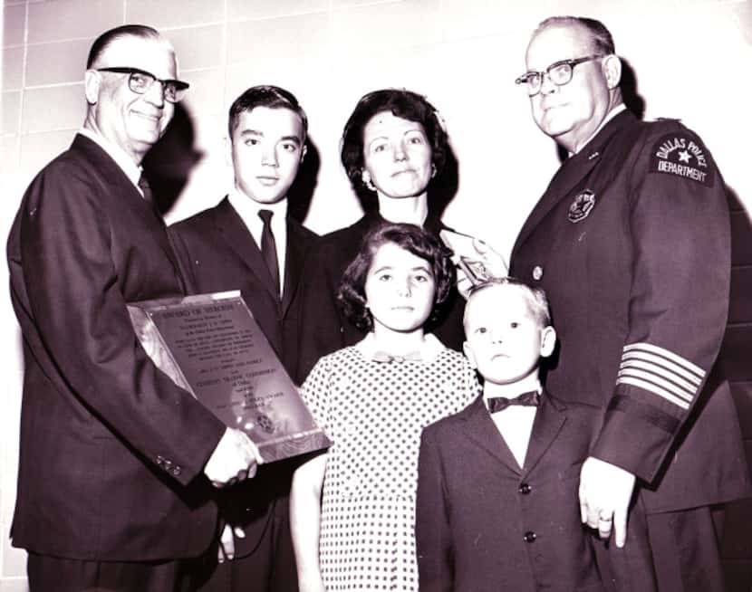 Maria Tippit and her children -- Allan, Brenda and Curtis -- attended a ceremony in which...