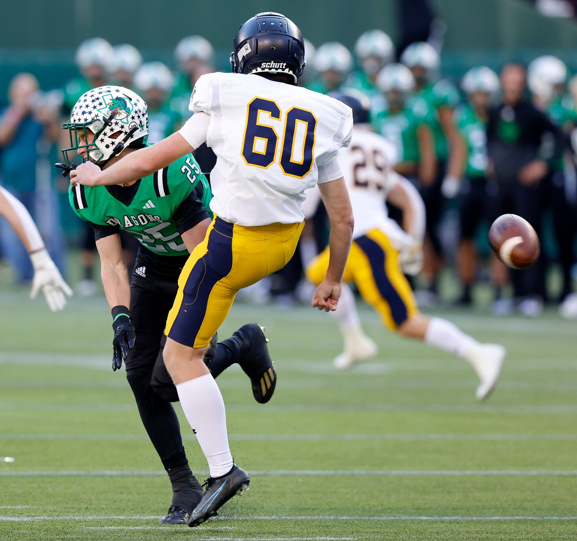 Southlake Carroll defensive back Sam Fuller (25) blocks a punt by Highland Park’s William...