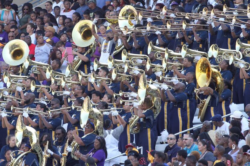 Members of the Prairie View A&M band perform from the stands during first quarter action of...