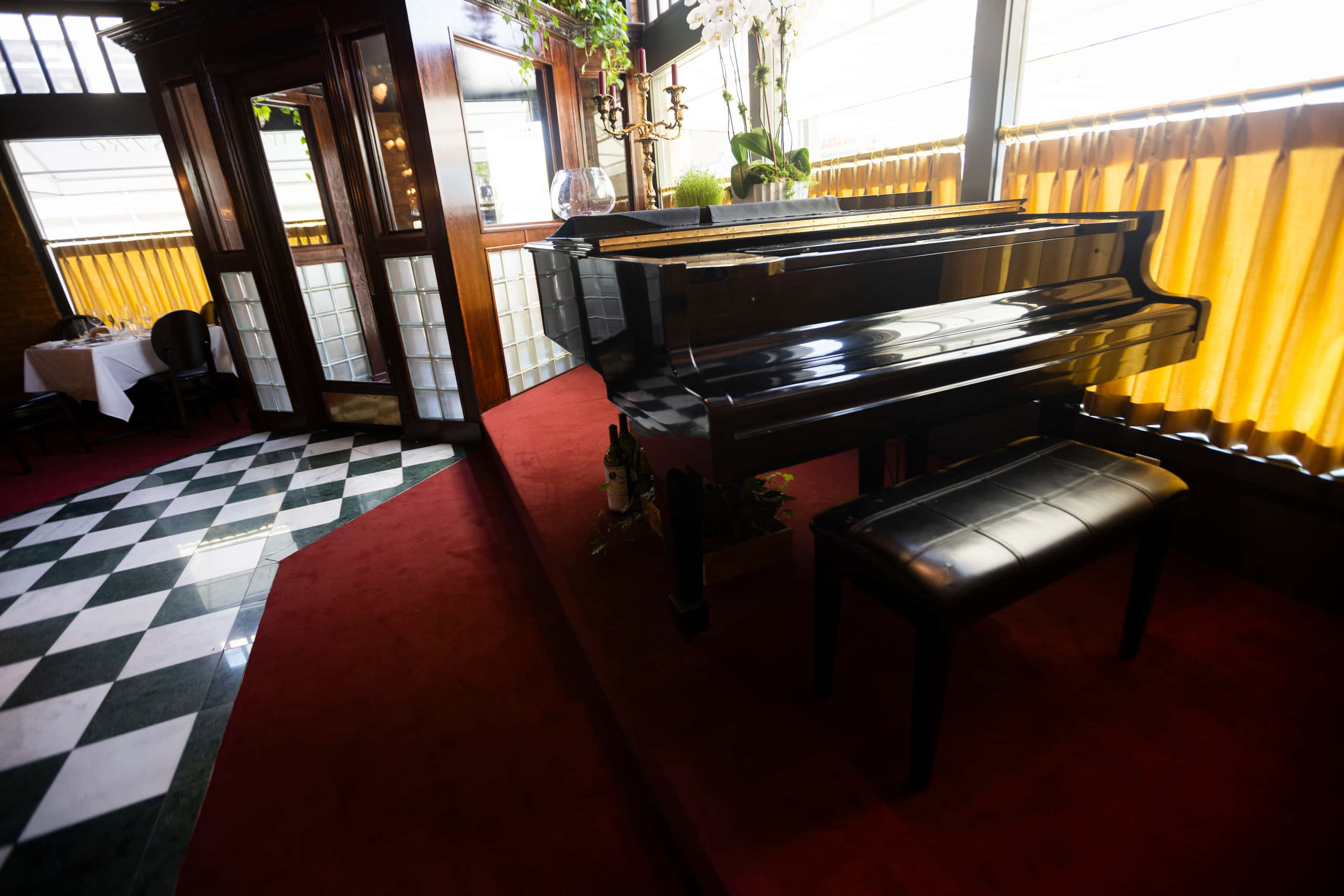 The piano at St. Martin's Wine Bistro is a focal point, as it used to be. It's right inside...