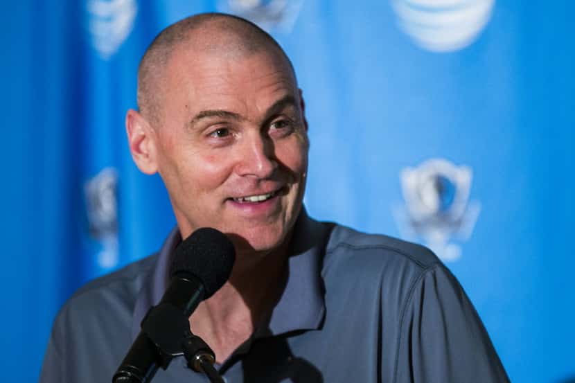 Dallas Mavericks head coach Rick Carlisle announces A.J. Hammons as their draft pick during...