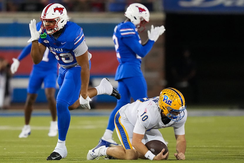 SMU defensive end Isaiah Smith (58) celebrates after sacking Pitt quarterback Eli Holstein...