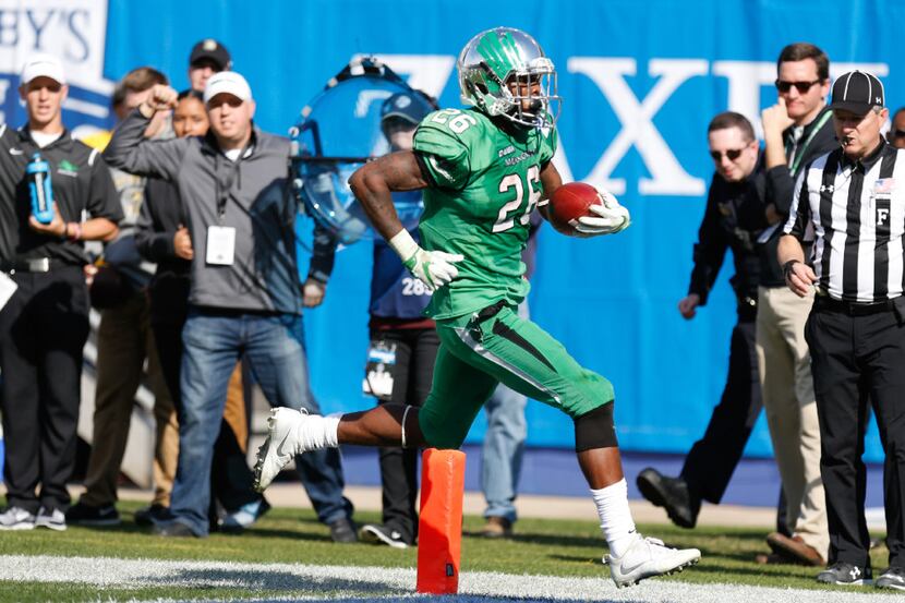 North Texas junior running back Jeffery Wilson (26) rushes in for the touchdown against the...