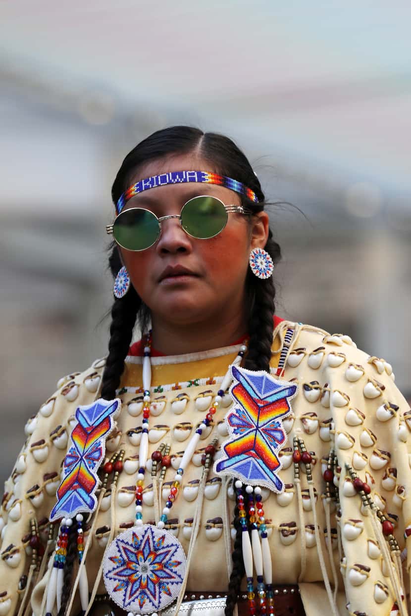 Grand prize winner Juliane Rives, who is Kiowa and Comanche, wore a traditional buckskin...